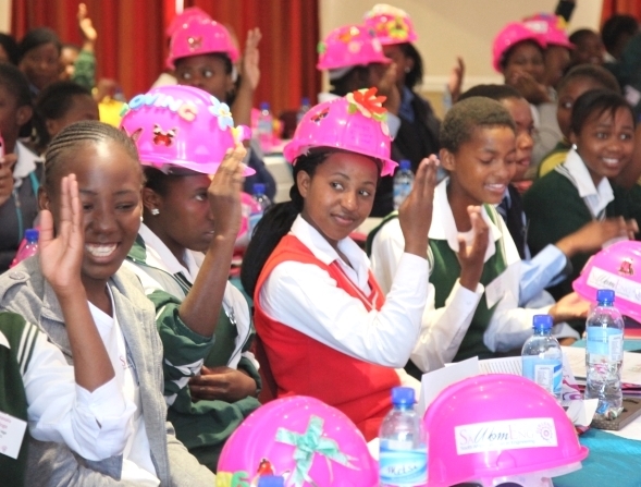 Women waering helmet on International Women’s Day