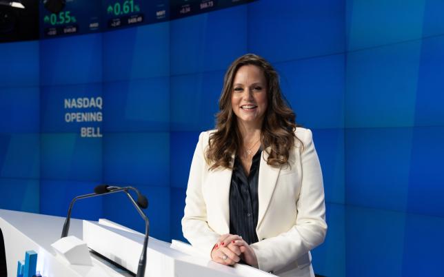 IYF's Christina Sass at the NASDAQ opening bell screen